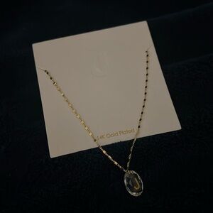 Beautiful “J” in 14K Gold Plated on a clear crystal necklace